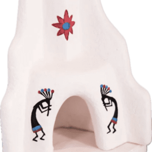 Decorative white clay oven with Kokopelli figures and a flower motif.
